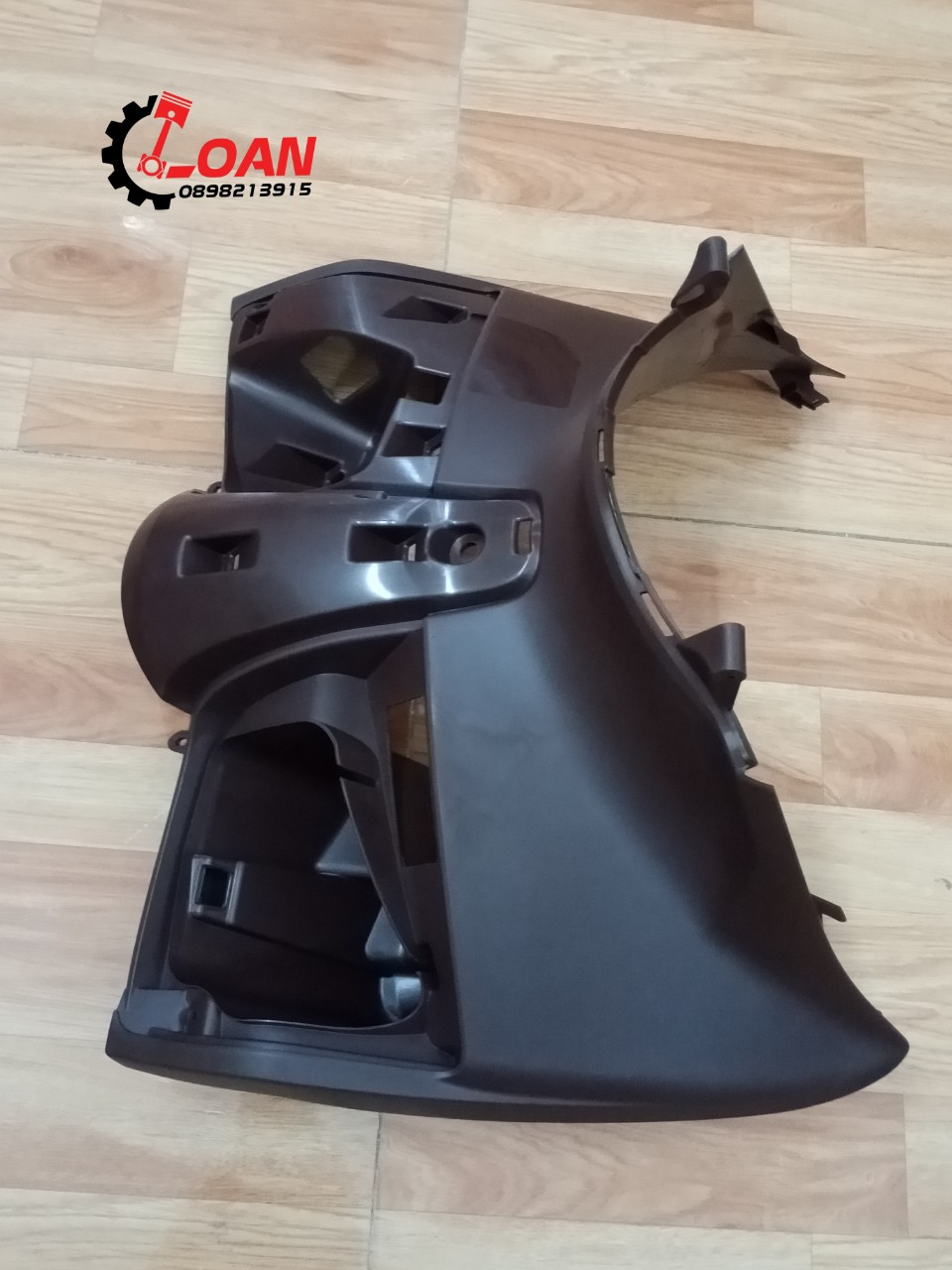 Yếm ổ khóa PCX màu nâu hàng zin chính hãng Honda