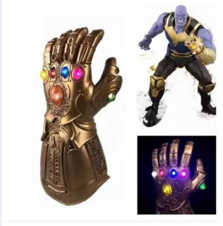Găng tay hoá trang siêu anh hùng Thanos loại mềm cao cấp các ngón tay gập được lại dùng pin có đèn và phát nhạc giúp bé hoá trang thành siêu anh hùng avenger chống lại cái ác, Do choi gang tay thanos dinh 6 vien da danh cho be trai