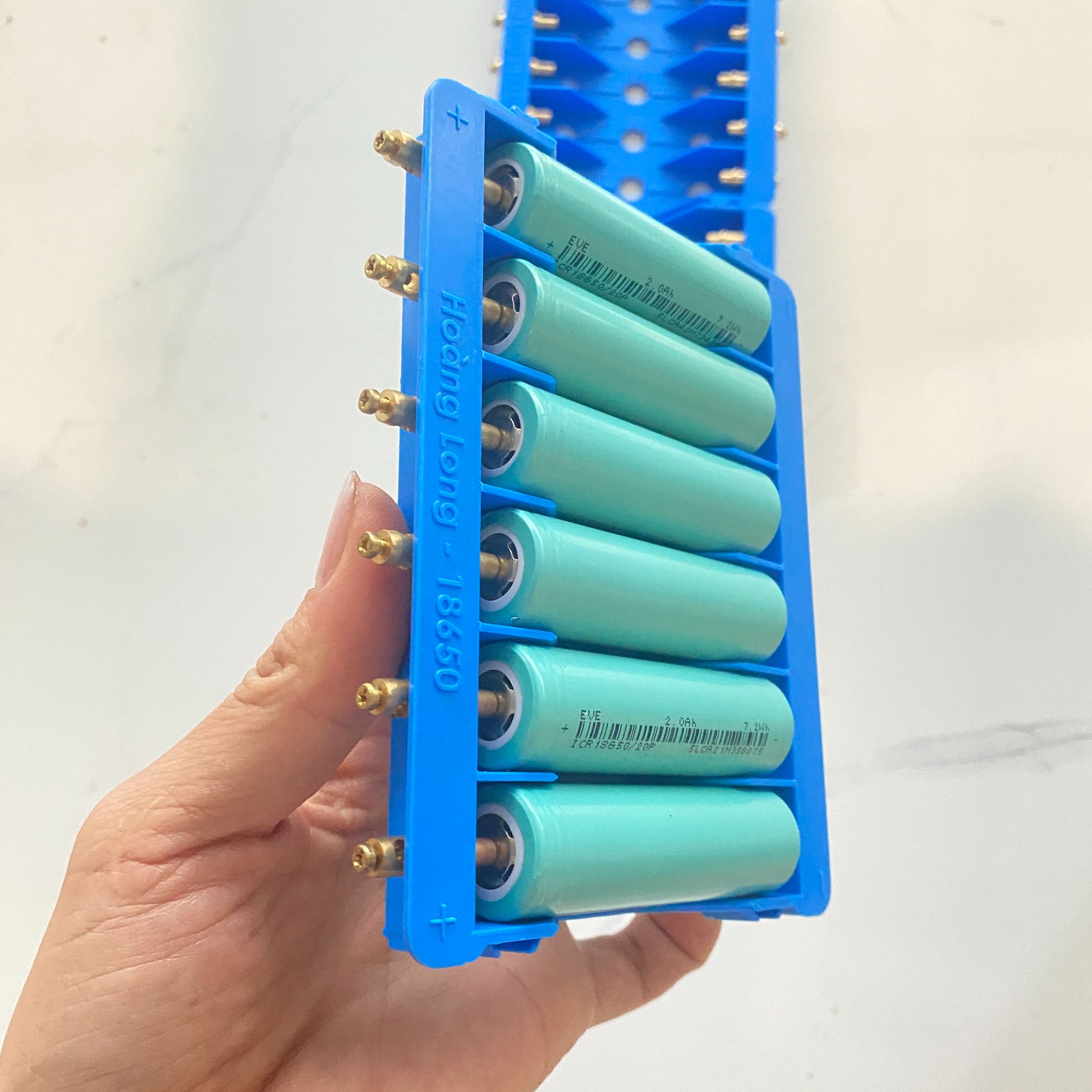 Khay cân bằng pin 18650 màu xanh ( khay 6)