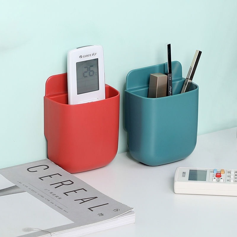 Kệ Dán Tường Để Remote,Giá Đỡ Điện Thoại Gắn Dán Tường Có Lỗ Sạc Tiện Lợi Mẫu Mới