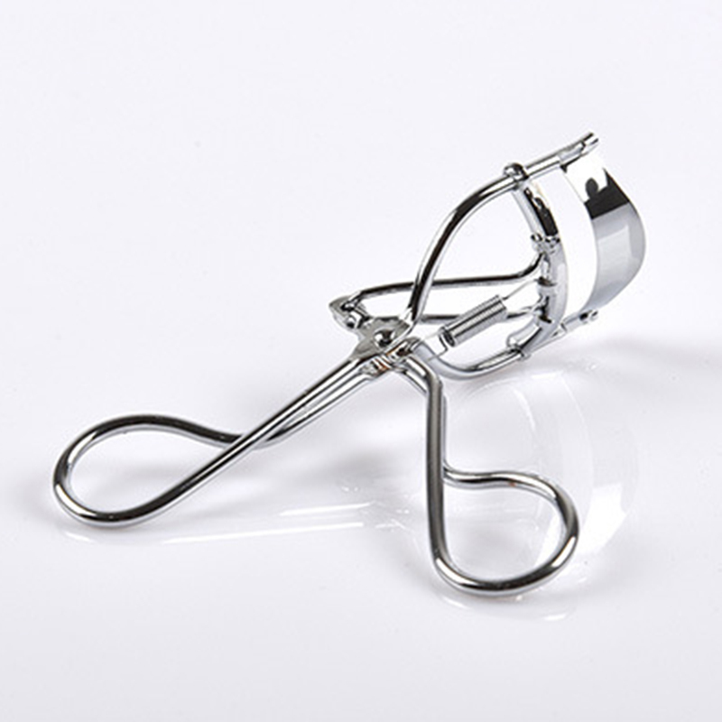 Silver-white metal eyelash curler, chrome plated with spring eyelash curler, practical beauty tool nhập khẩu