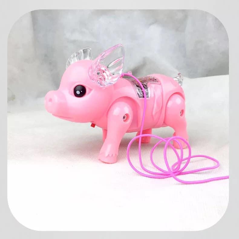 ( FREE SHIP - MUA 1 TẶNG 1 ) Đồ chơi chú HEO ( Lợn) biết đi có dây dắt ( chạy pin )