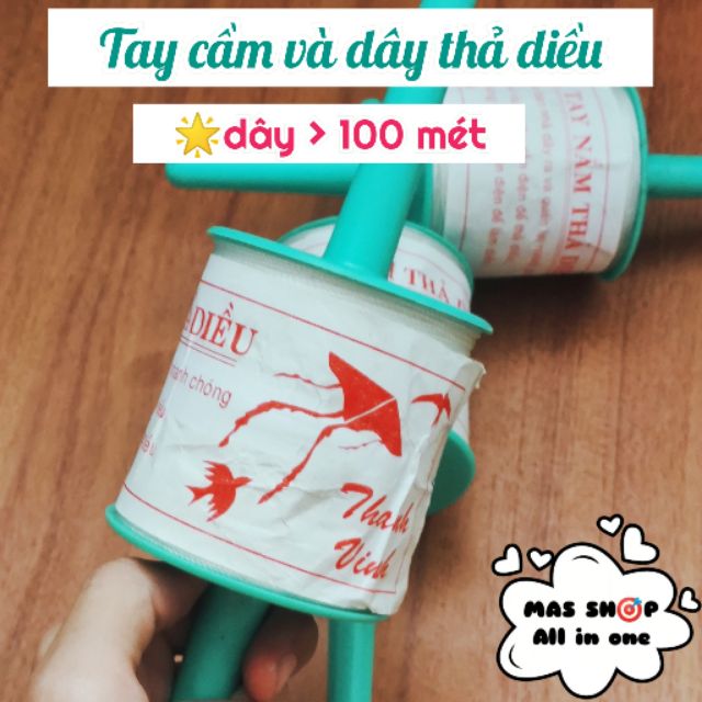 Tay cầm và dây nhợ thả diều hơn 100 mét