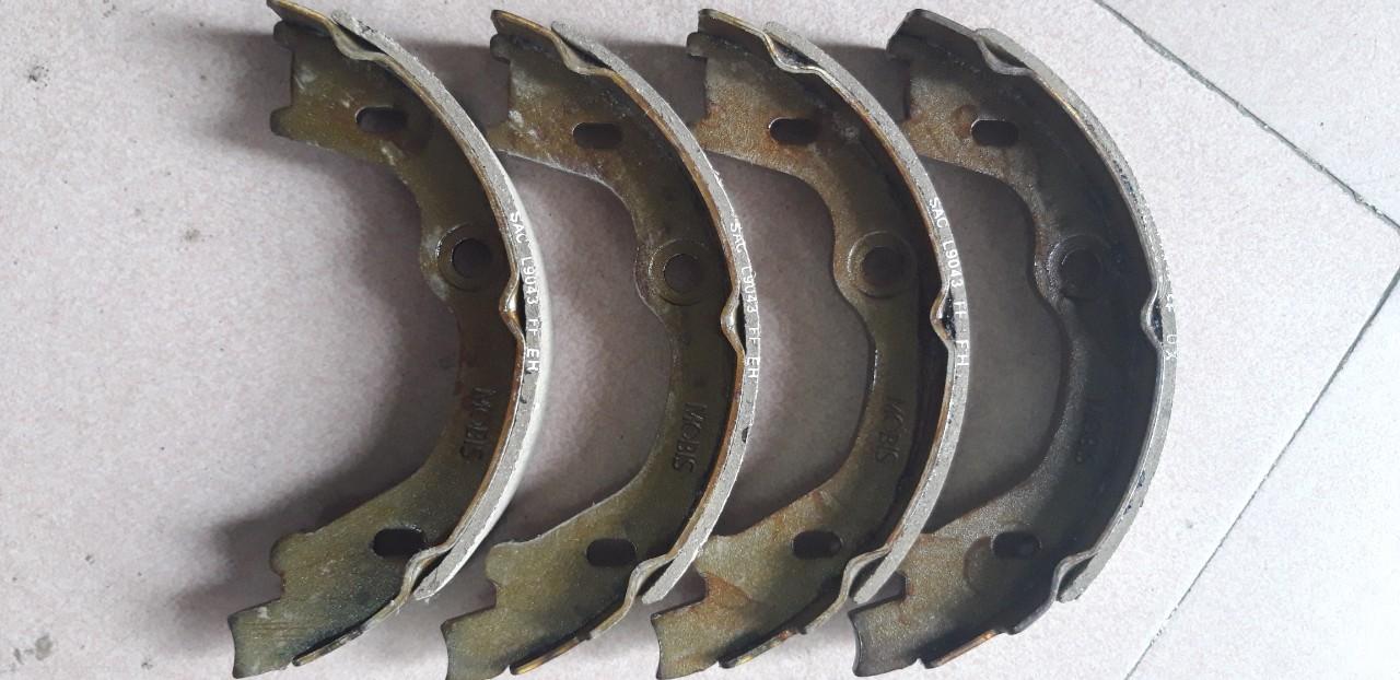 Má phanh tay Carens ( Giá 1 Bộ) Xịn