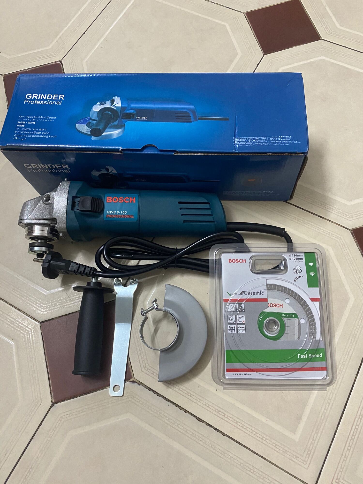 Máy mài cầm tay gws 6-100 tặng kèm lưỡi cắt đa năng