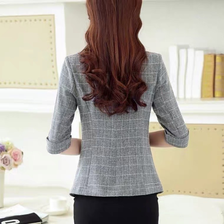 áo vest kẻ tay lỡ phong cách cho nữ
