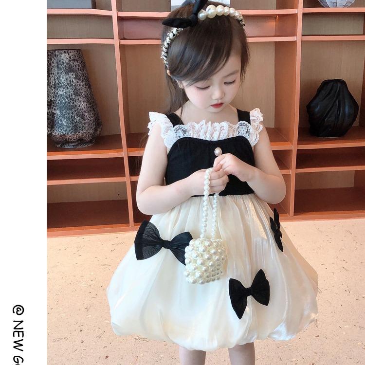 Váy 2 dây đính nơ xinh bồng bềnh