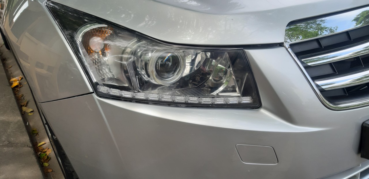 Ốp viền đèn pha xe Cruze