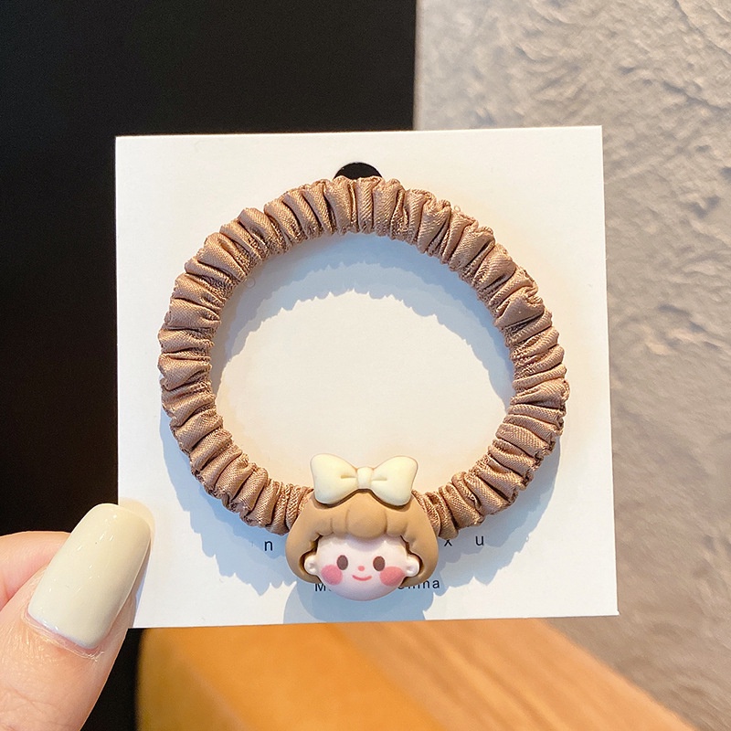 Scrunchies dây cột tóc cô gái nhỏ xinh xắn