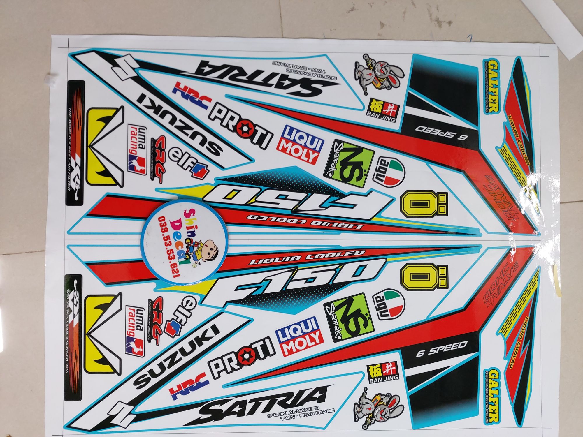 Tem xe satria fi suzuki f150 trắng đỏ