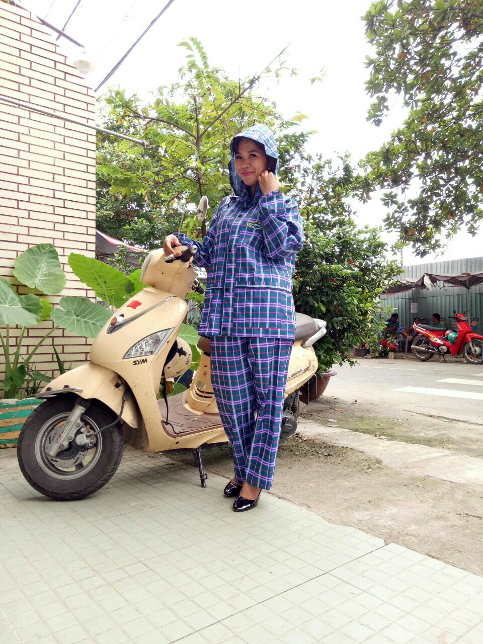 [HCM]Áo mưa bộ nhiều hoa văn cho nữ