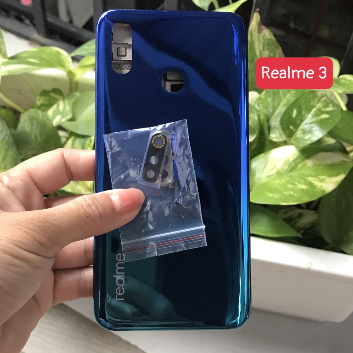 Bộ xương vỏ Realme 3 zin (bộ gồm lưng,sườn,nút bấm,kính camera)