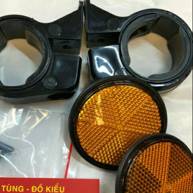 Mắt mèo phản quang gắn phuộc trước xe máy cực đẹp