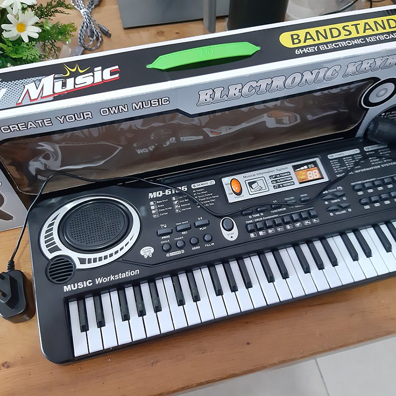 Đàn Piano điện tử 61 phím bấm kèm mic cho Bé