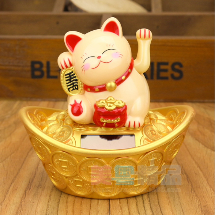 Mèo Ngoắc Ngồi Thỏi Vàng