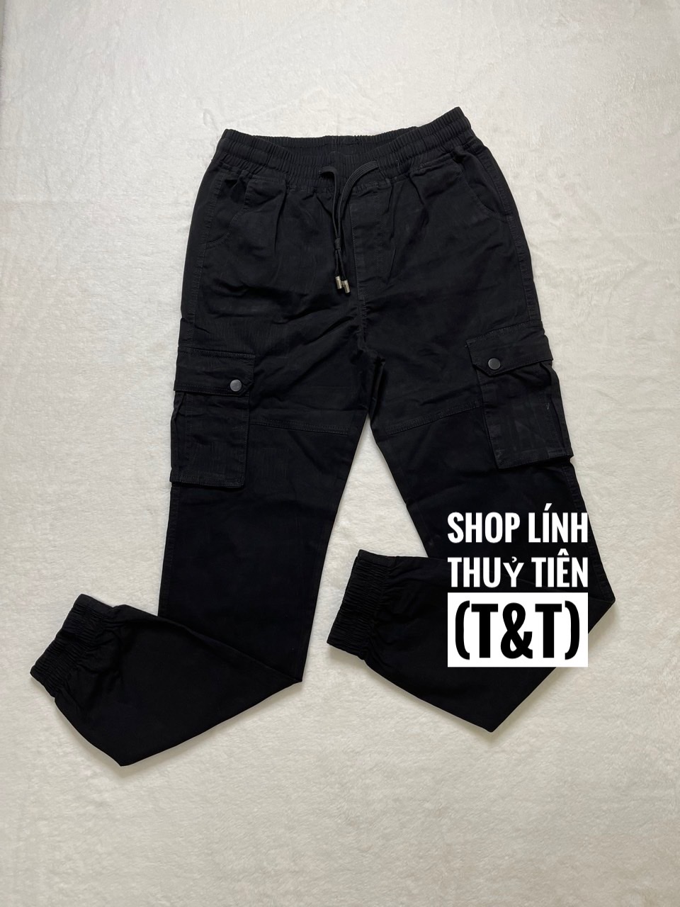 Quần jogger nam nữ màu đen.Quần nam nữ kaki màu đen đậm lưng thun ống bo.Chất vải kaki bền màu thấm hút mồ hôi _THUỶ TIÊN SHOP