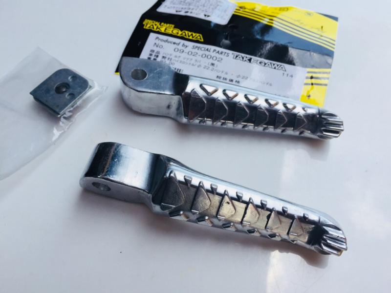 Gác chân cá xấu bật bi cho xe máy honda