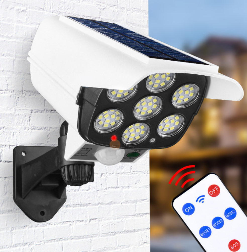 Đèn năng lượng mặt trời giả camera cảm biến tự động an toàn chống trộm, có điều khiển từ xa- Ba chế độ chiếu sáng - Lazano Shop