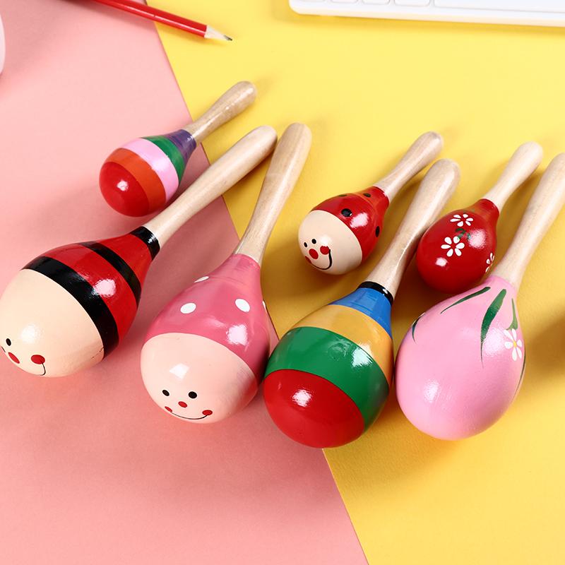 Lục lạc gỗ tròn tập cầm nắm size bé