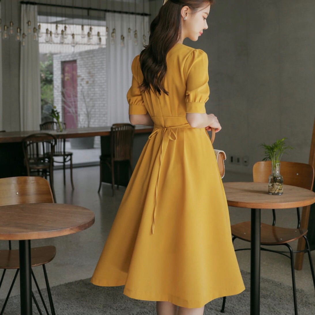 Đầm freesize vàng bo eo