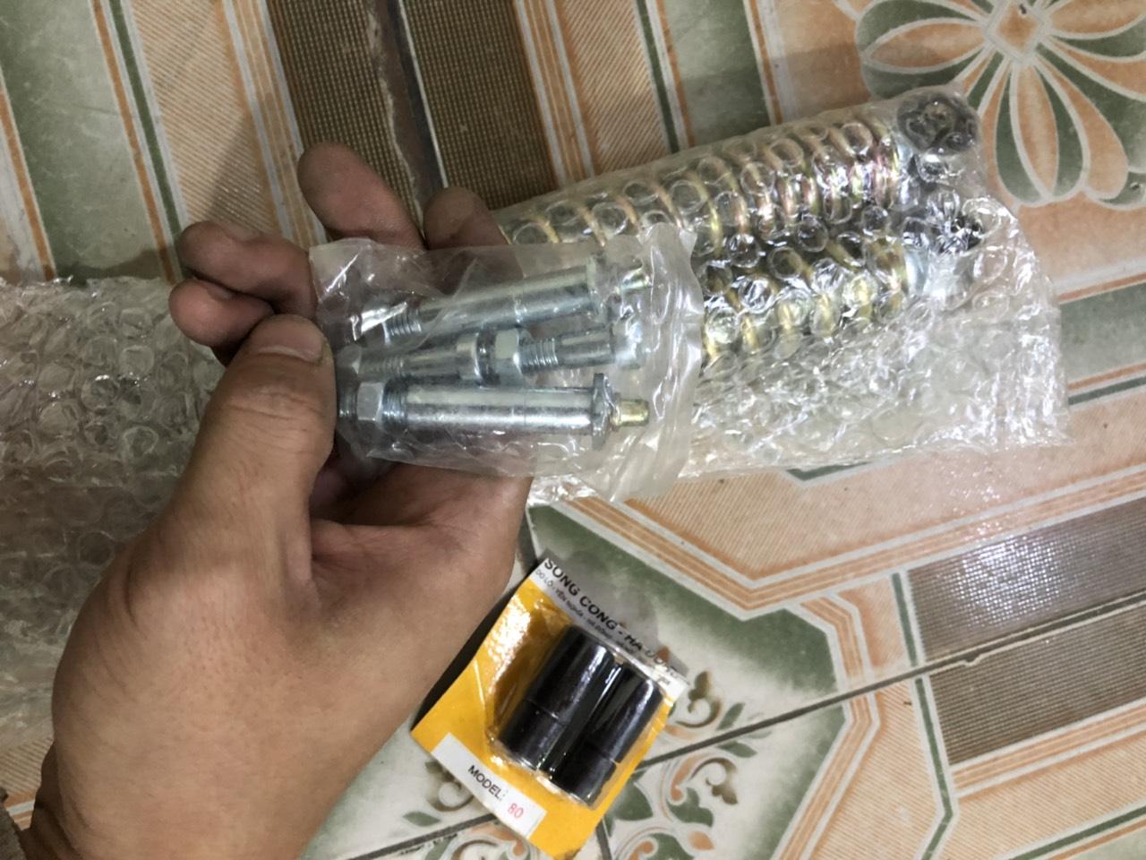 Trọn bộ giảm sóc trước honda cub ( đầy đủ ốc bắt )