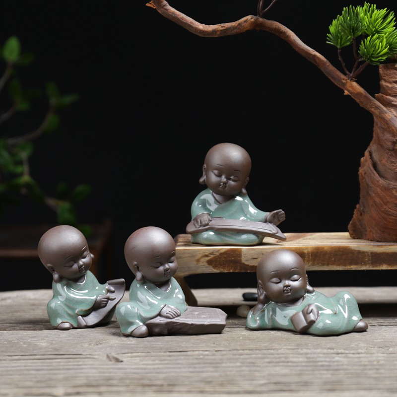 Bộ tượng chú tiểu cầm kì thi họa
