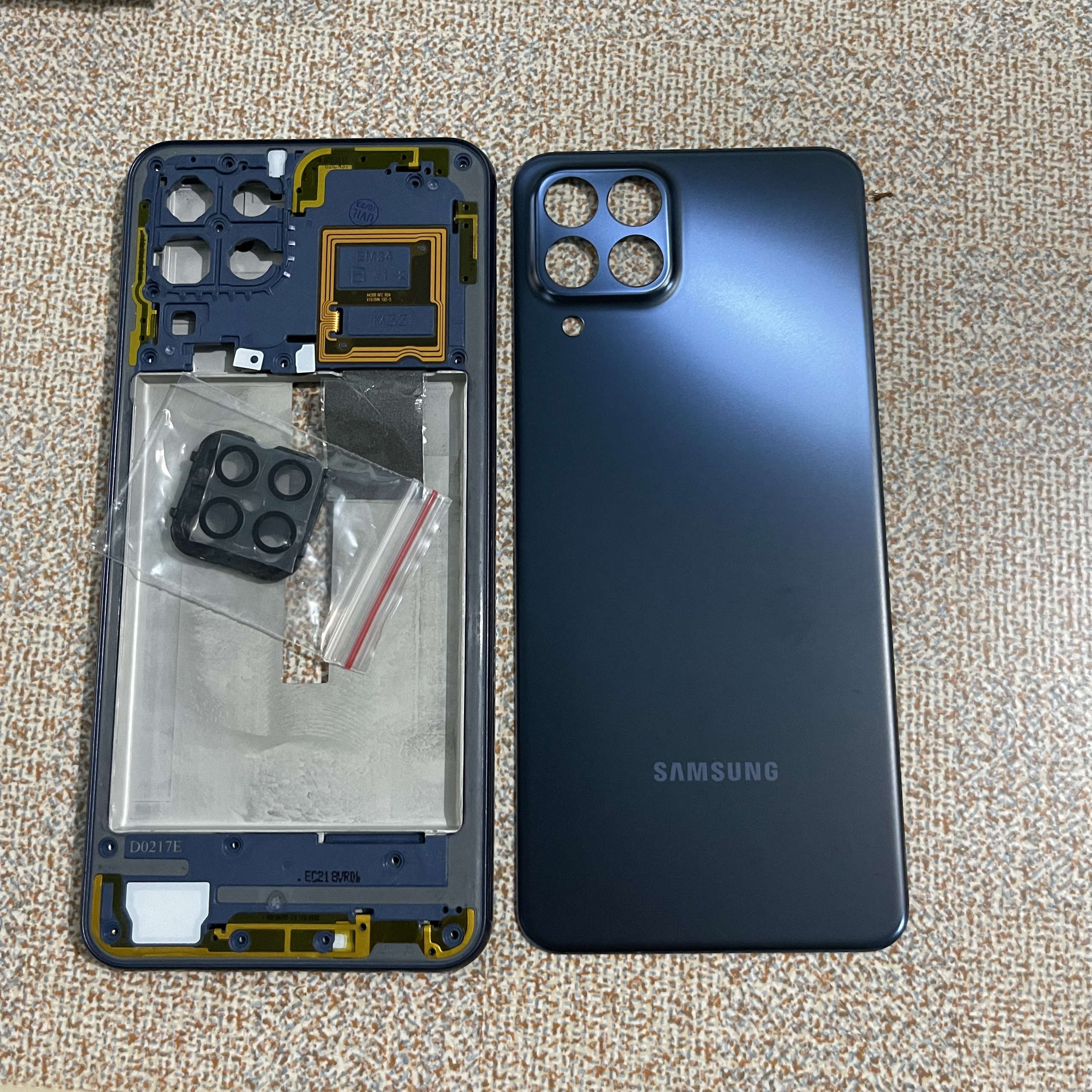 bộ vỏ samsung m33 zin có kính cam