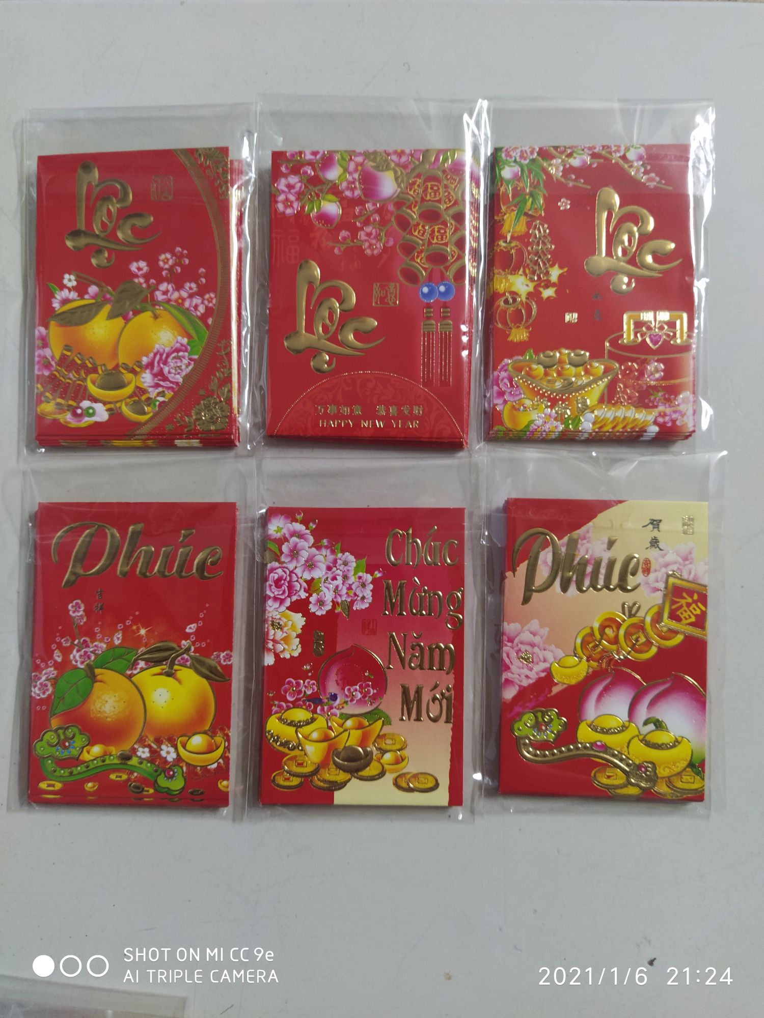[HCM]COMBO 2000 BAO LÌ XÌ NHỎ NHŨ VÀNG KT 6.5X9.5CM