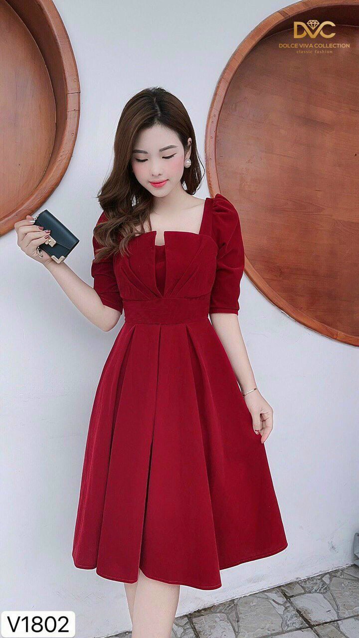 Đầm xoè chân dập ly cúp ngực tay lỡ