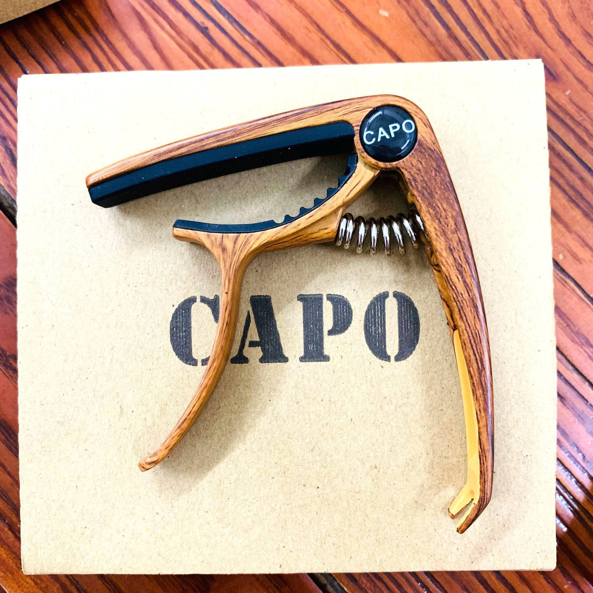 Capo Đàn Guitar Acoustic / Vân Gỗ Cao Cấp