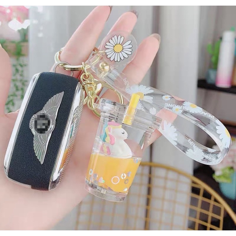 MÓC KHOÁ TRÀ SỮA KỲ LÂN HOA CÚC