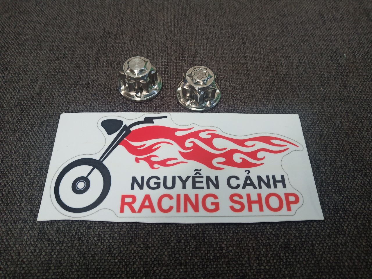 ốc salaya vặn phuộc sau wave dream 2 con 10li