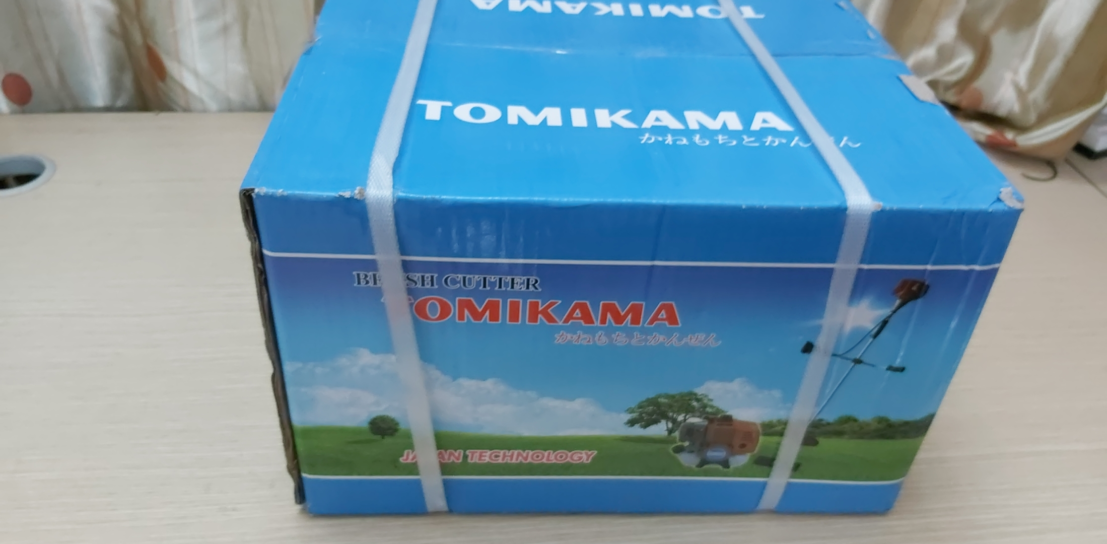 Máy cắt cỏ đeo vai Tomikama 330