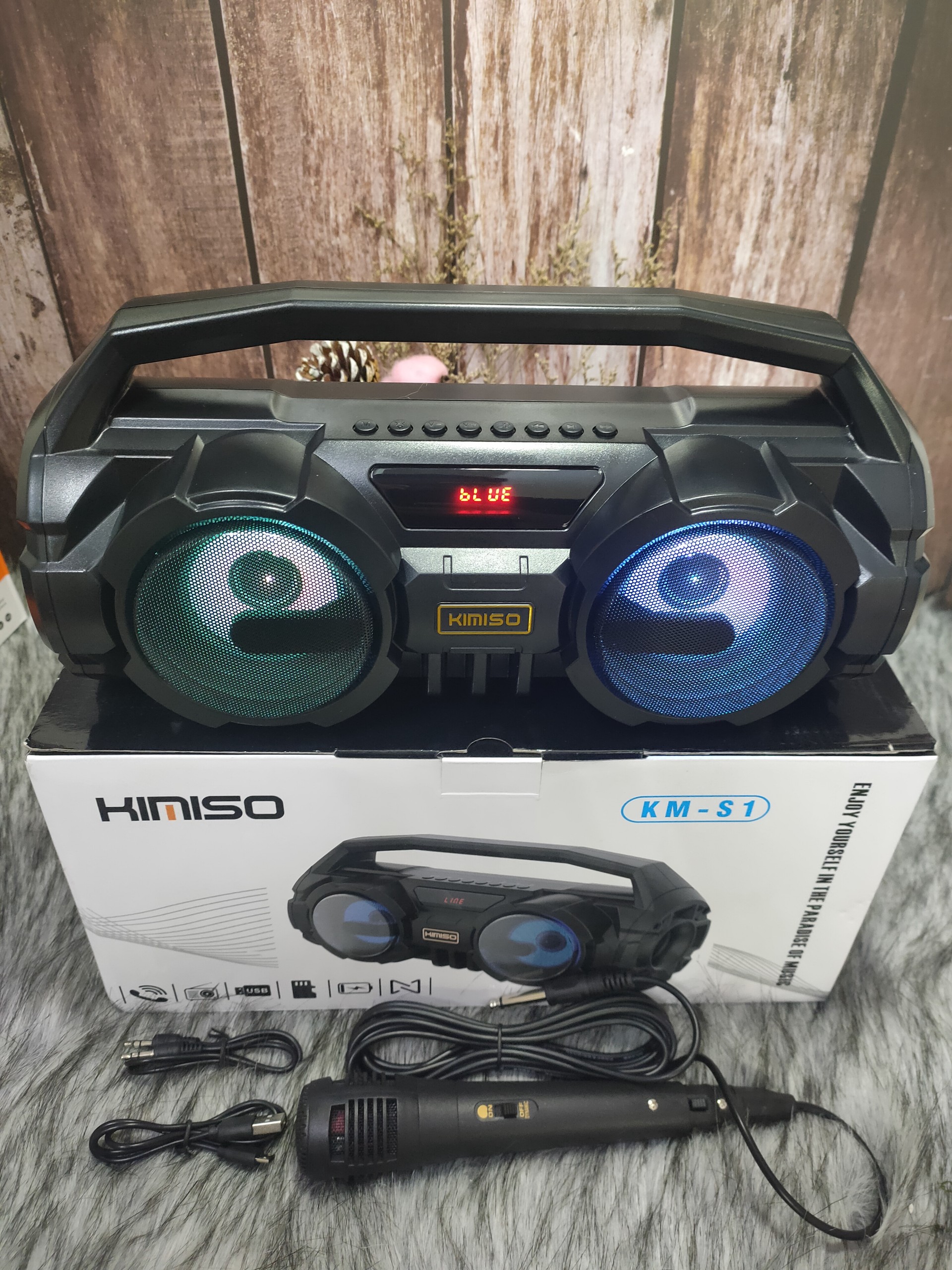 Km-s1 e818 Bluetooth karaoke speaker direct plug wired microphone karaoke speaker LED lamp strobe strong bass battery nice design 5D surround sound