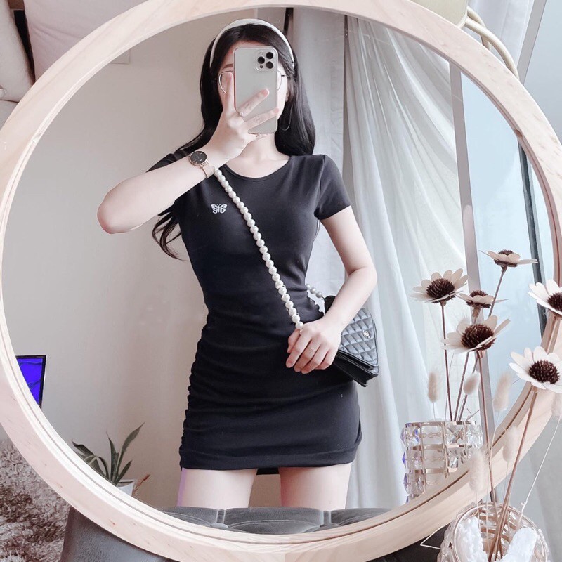 Váy lô gô bướm rút hông TT12