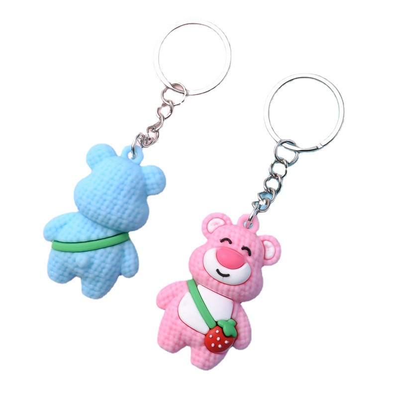 Móc khóa gấu đeo túi quả dâu cute