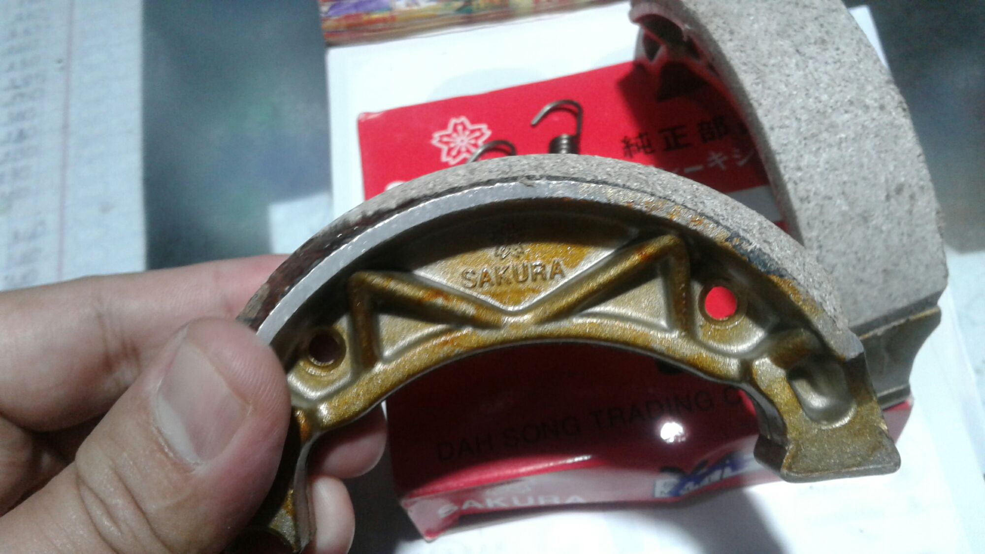 Bố đùm (má phanh) trước SIRIUS, JUPITER hiệu Sakura