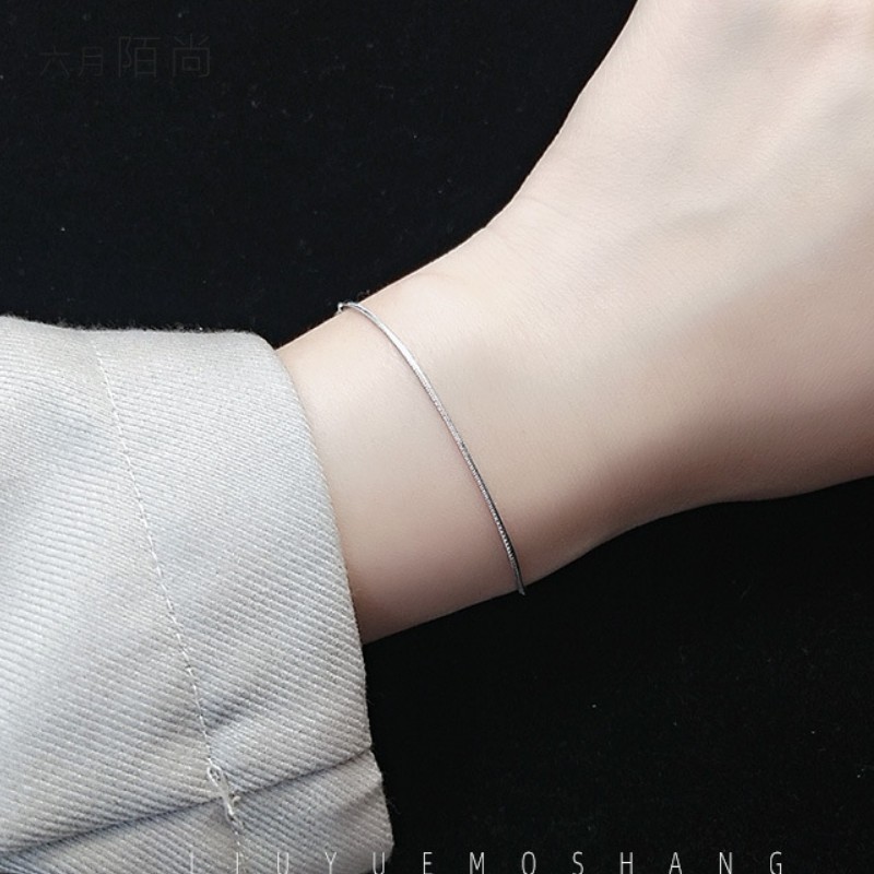 Lắc Tay Nữ Sợi Mì Titan Ko Đen TT 2754