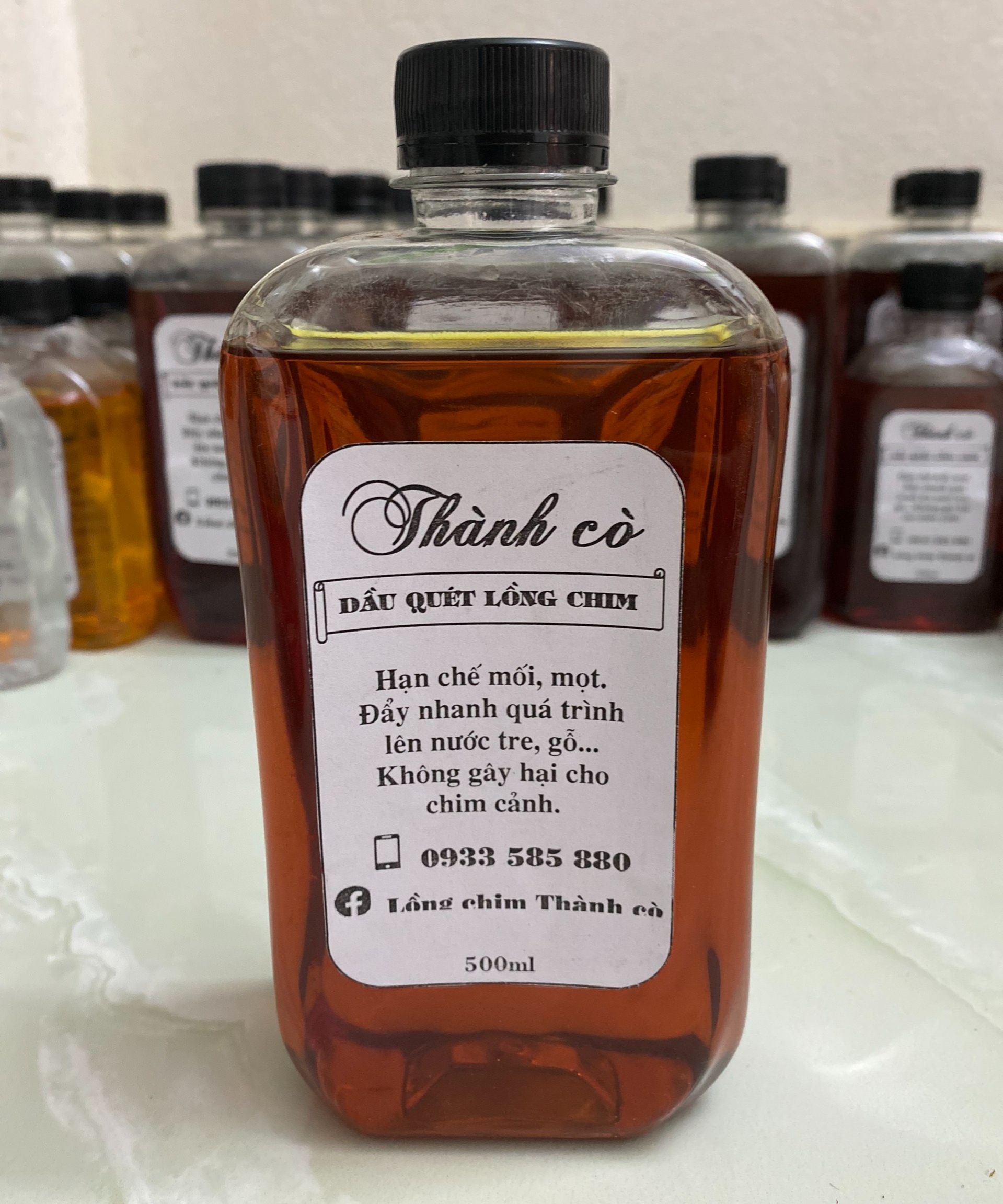 Dầu quét lồng chim Thành cò chai 500ml