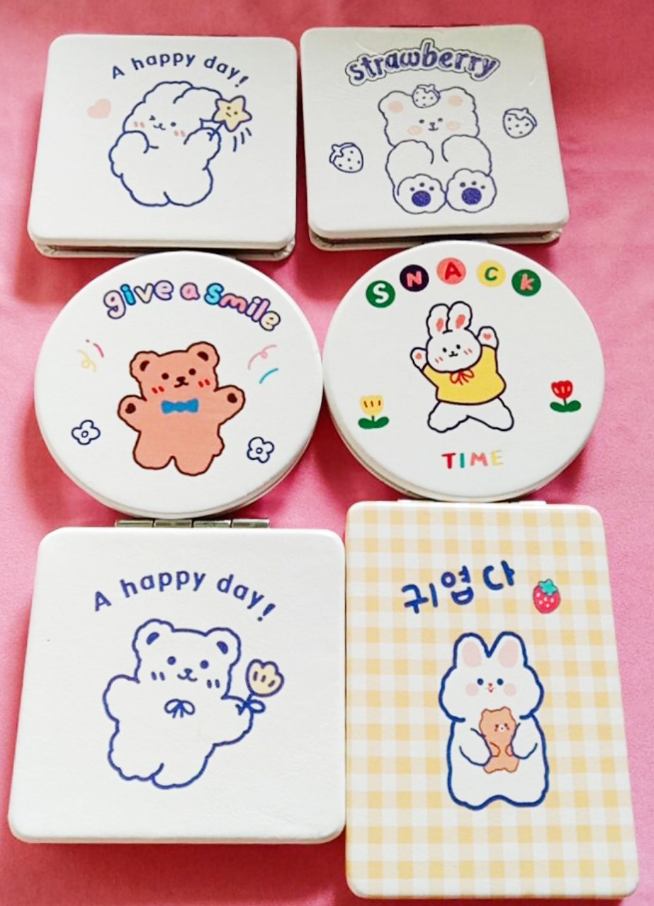 Gương 2 mặt mini cầm tay