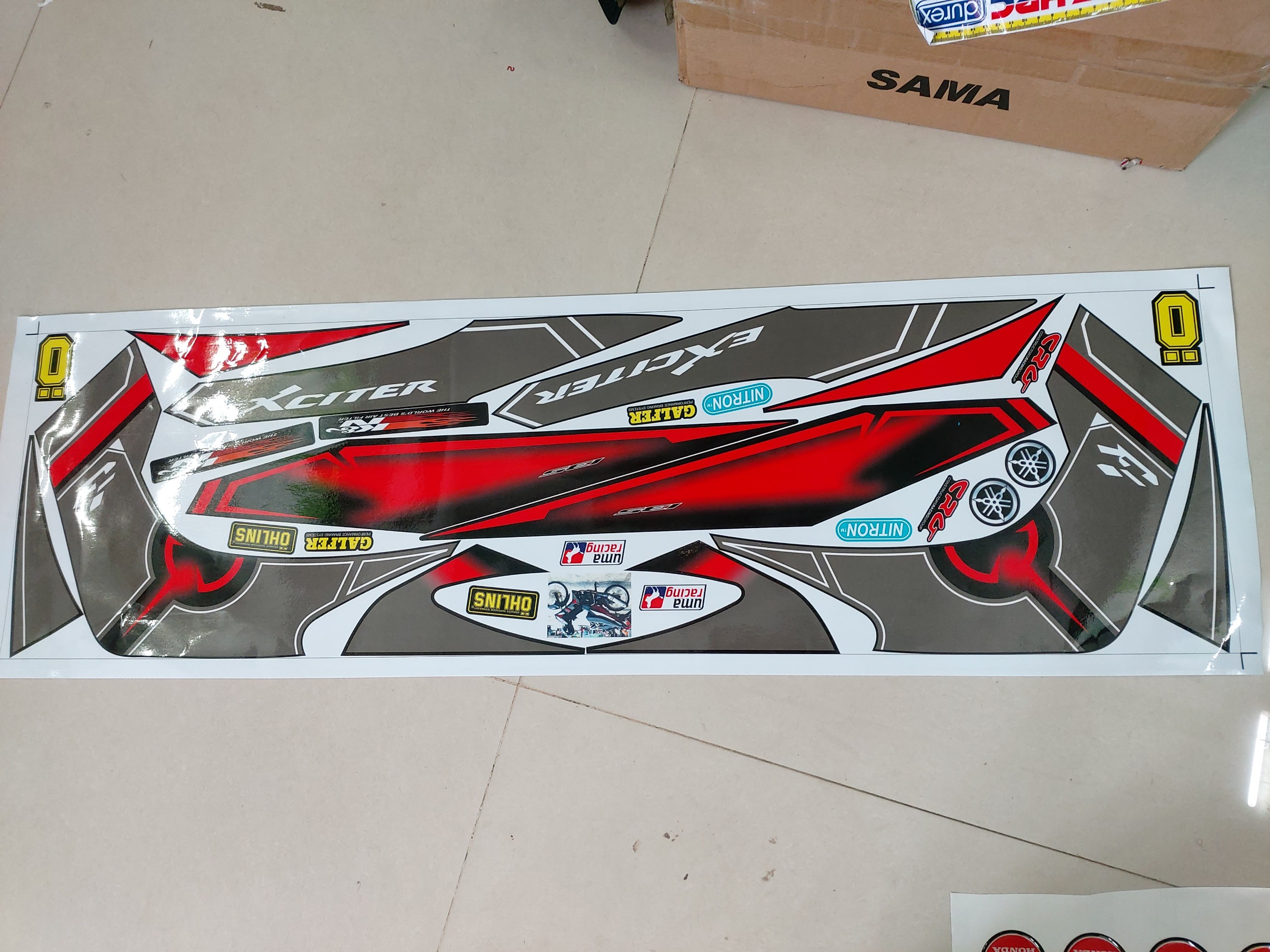 Tem xe exciter 2010 mẫu thái tặng logo