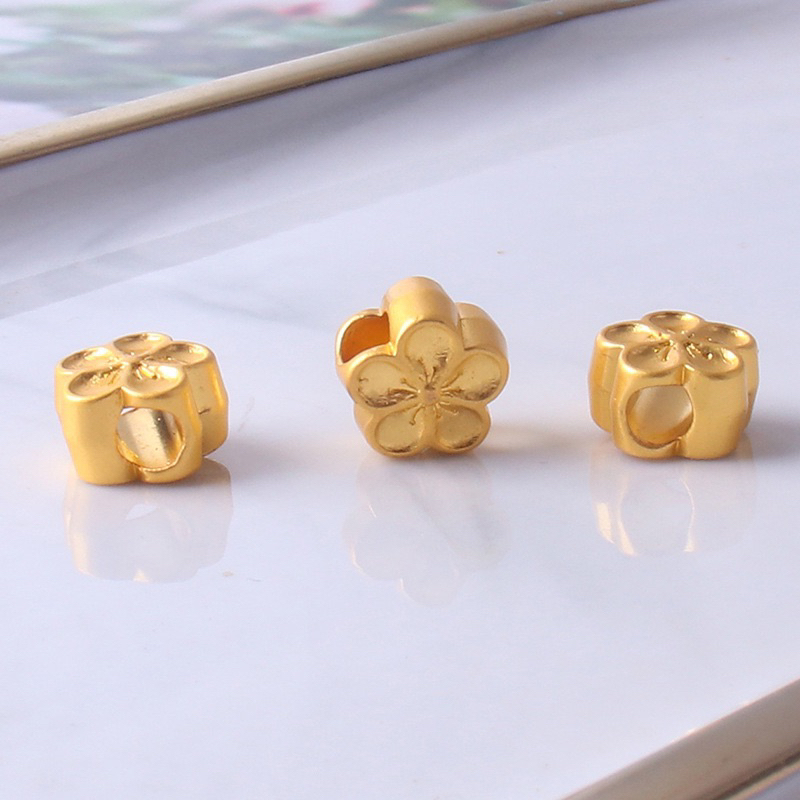 Charm xỏ ngang hoa mai vàng - KL201