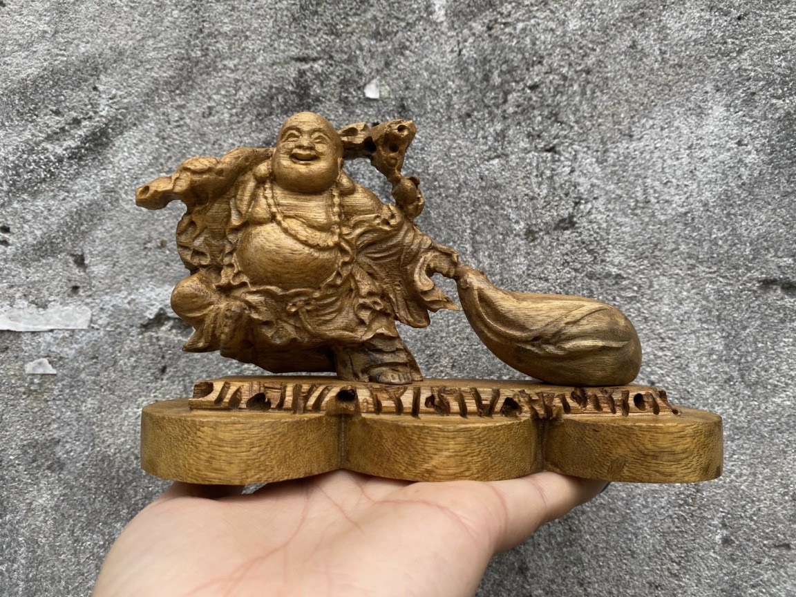 Happy buddha agarwood statue