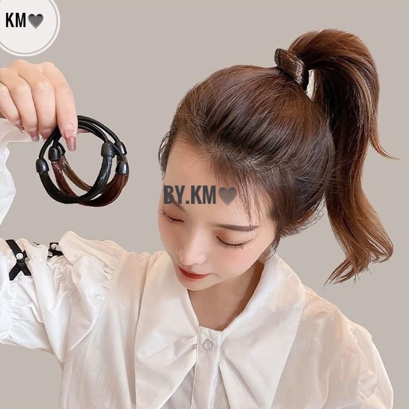 cột tóc bằng tóc giả