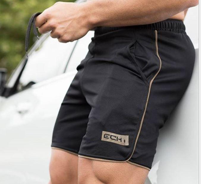 Quần đùi thể thao tập gym ECHT nam SQ470 chất liệu vải mè poly nhập khẩu, logo in tranfer firm không thể bong tróc, 2 túi 2 bên hông, lưng bằng thun co giãn.