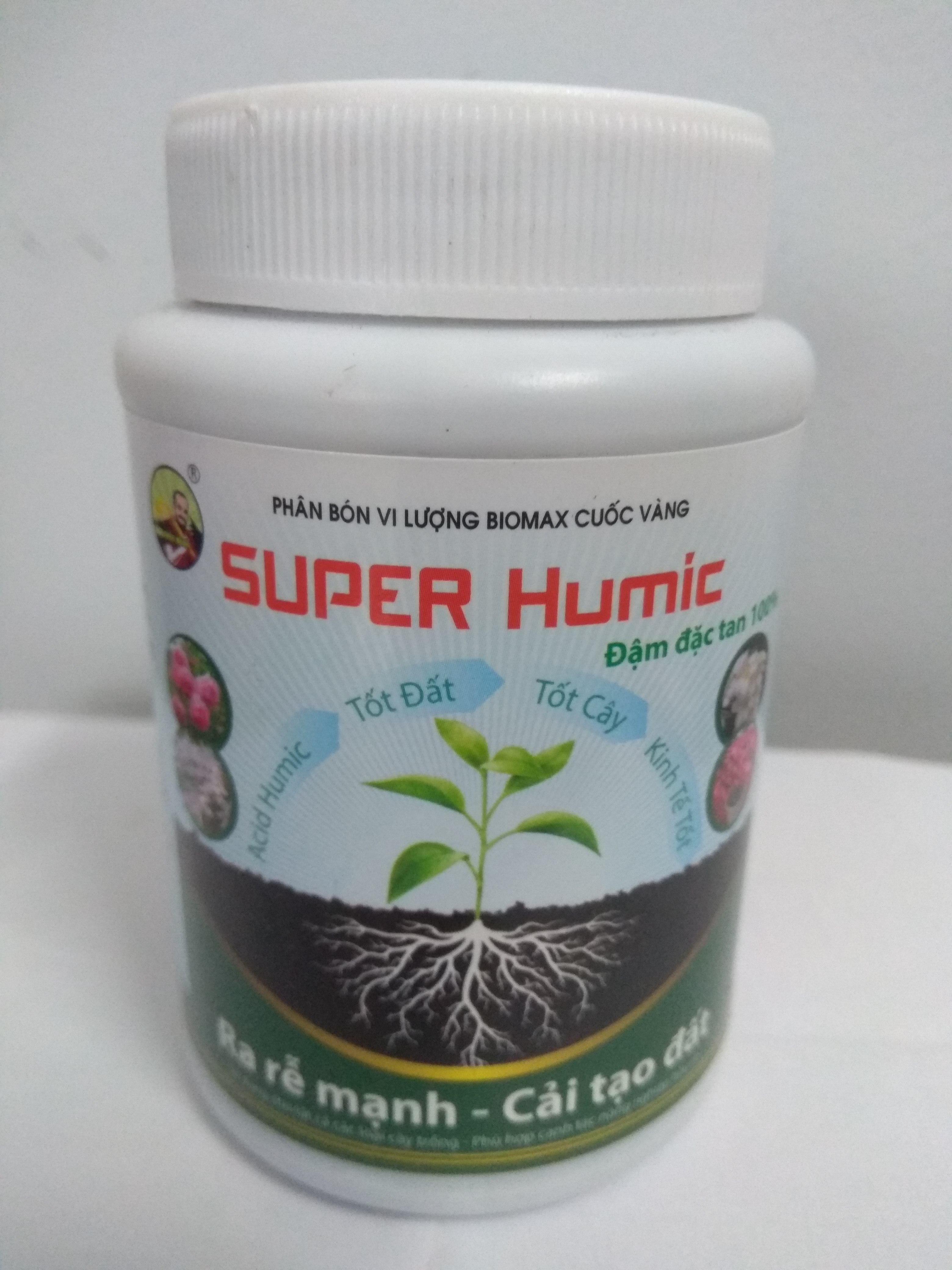 Phân bón vi lượng ra rễ mạnh cải tạo đất super humic - chai 100 gram biomax