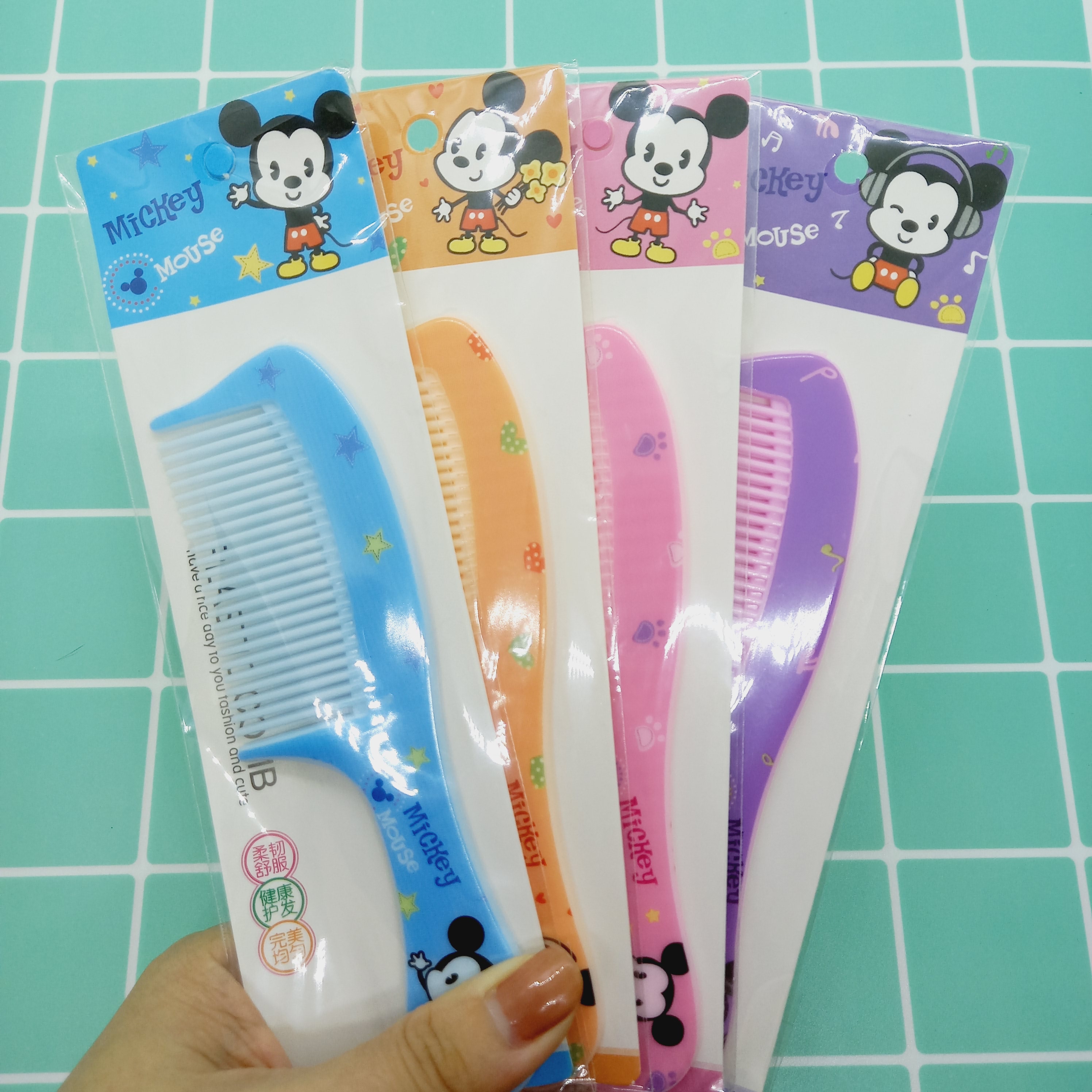 Lược chải tóc mini cầm tay tiện lợi chuột Mickey