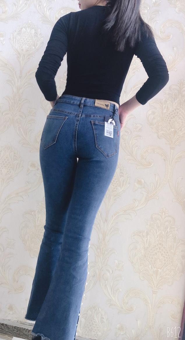 Quần jeans nữ ống loe dài xẻ gấu