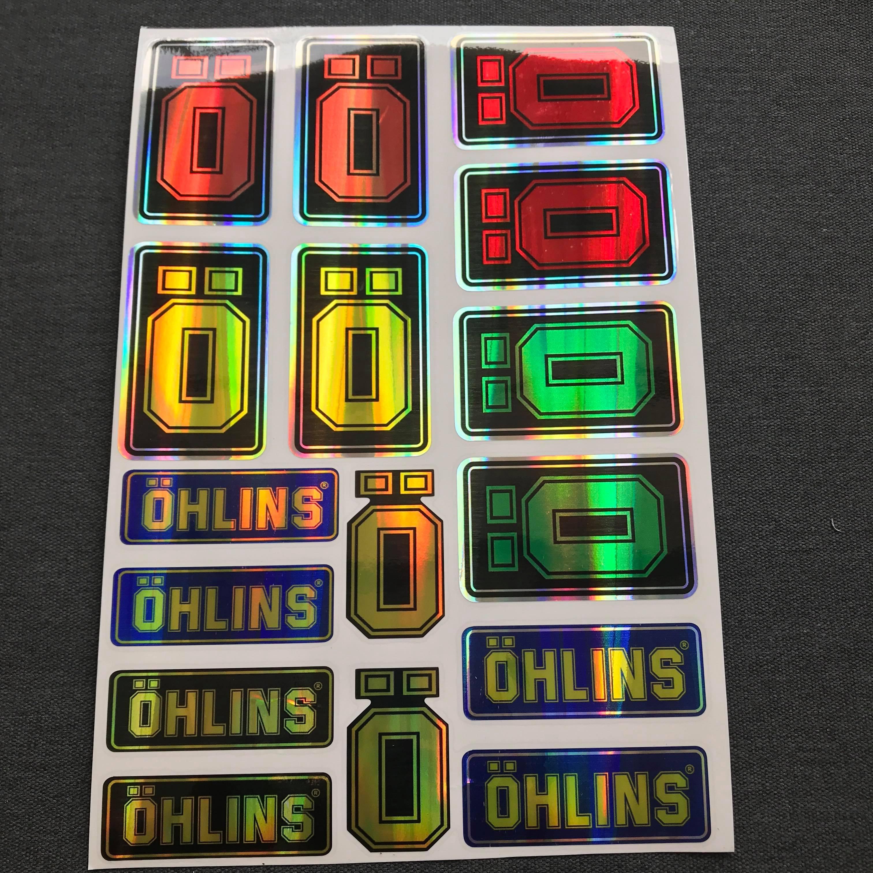 Tem logo mạ crom OHLIN cho xe máy.