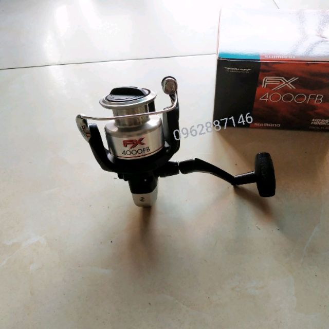 Máy câu cá shimano fx4000 loại 1 malaisia   ( xả kho )